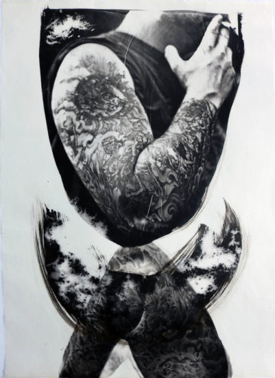 A man who has tattoos derived from Durer's woodcuts of the Apocalypse. His arm is reflected below interrupted by shapes that symbolize the Covid-19 virus that was pandemic worldwide.