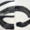 A hand and snake are forming a circle symbolizing an uroboros which is used to image wholeness and infinity. The hand seems to be grasping toward this wholeness.