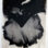 Dramatic black triangle seems to pierce the petal beneath in this print of an Iris.