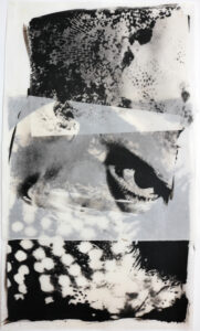 She looks out between an image of a hurricane and an image of seawed.